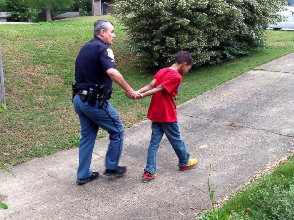 aaa kid hancuffed