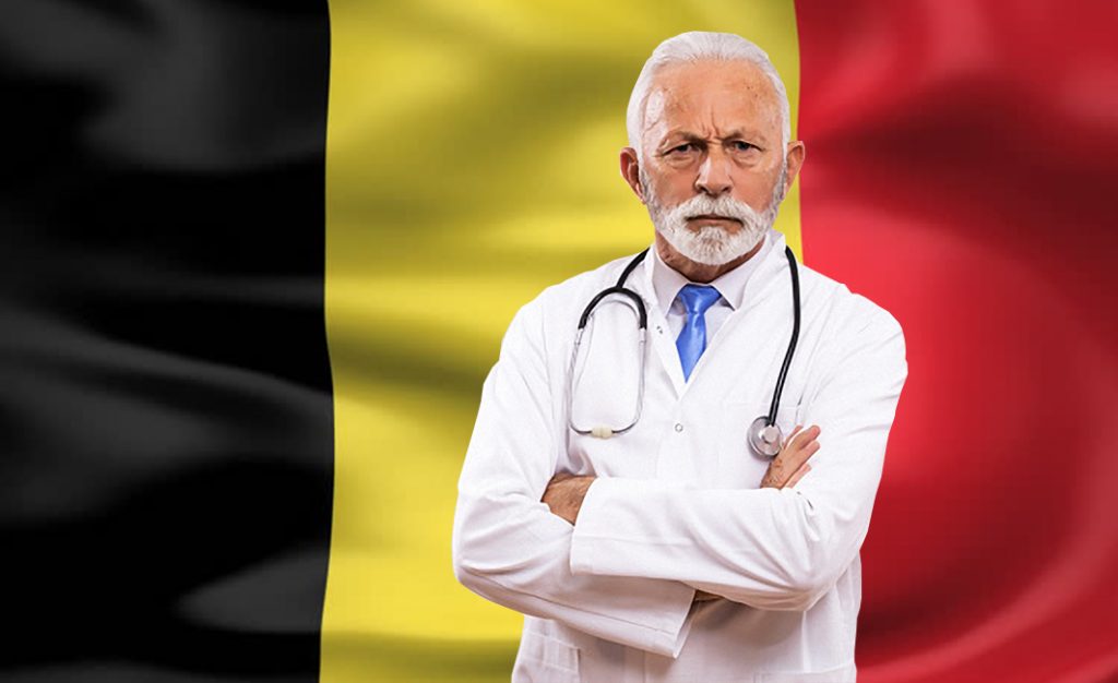 Handsome senior doctor man wearing medical coat Shouting frustrated with rage, hands trying to strangle, yelling mad